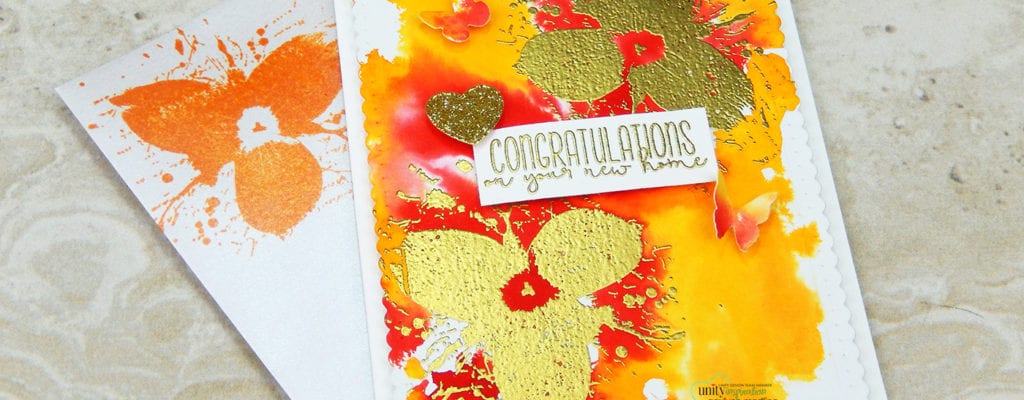 Ink spray watercolor card with gold heat embossing.