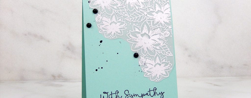 Handmade floral vellum card overlay.